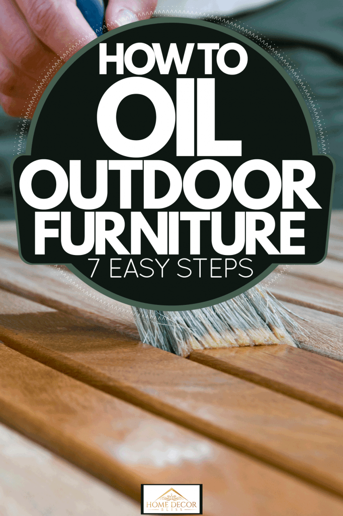 A man brushing the deck with oil to make it look brand new, How To Oil Outdoor Furniture [7 Easy Steps]