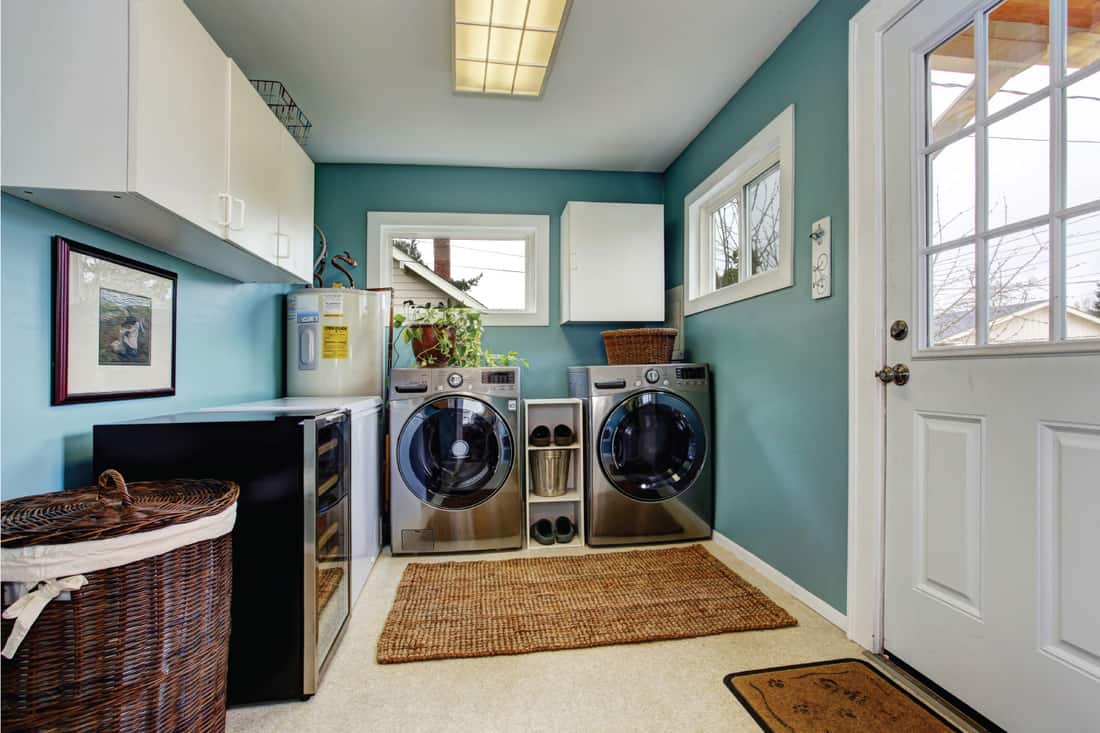 Laundry room with modern steel appliances