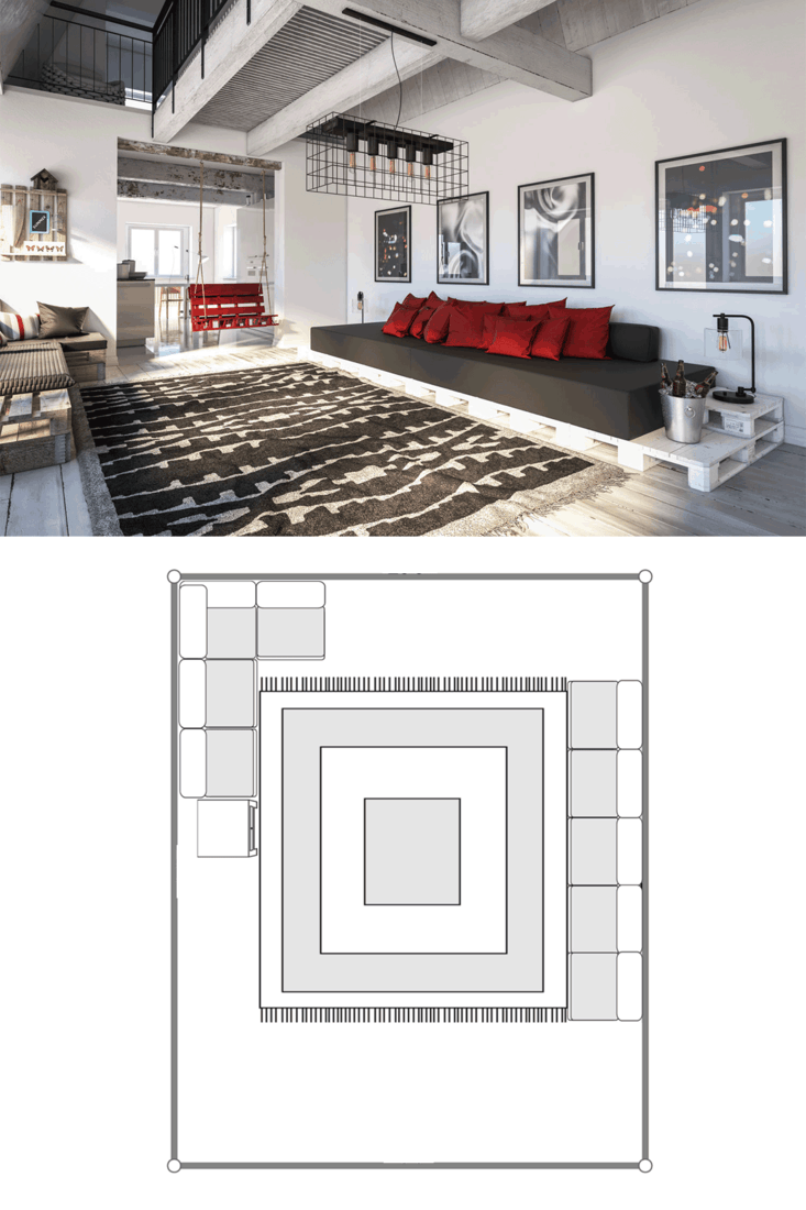 Luxurious industrial type themed living room with protruding lamps, long black and red sectional sofa, and a huge patterned rug