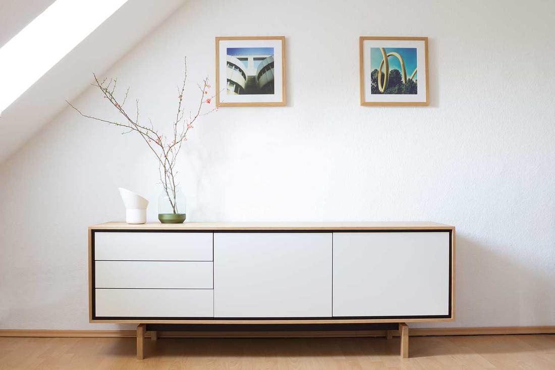 Modern sideboard in bright living room with Scandinavian design