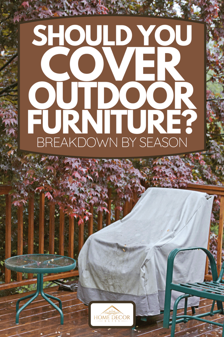 A rain wet wooden deck with a covered lawn chair and the drenched red canopy of a beautiful Japanese maple tree, Should You Cover Outdoor Furniture? [Breakdown By Season]