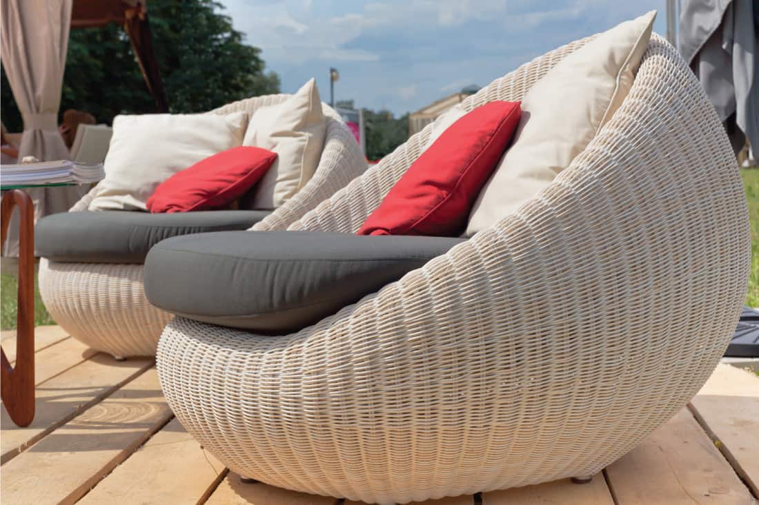Soft armchairs with color pillows outdoors, What Is The Best Fabric For Outdoor Furniture