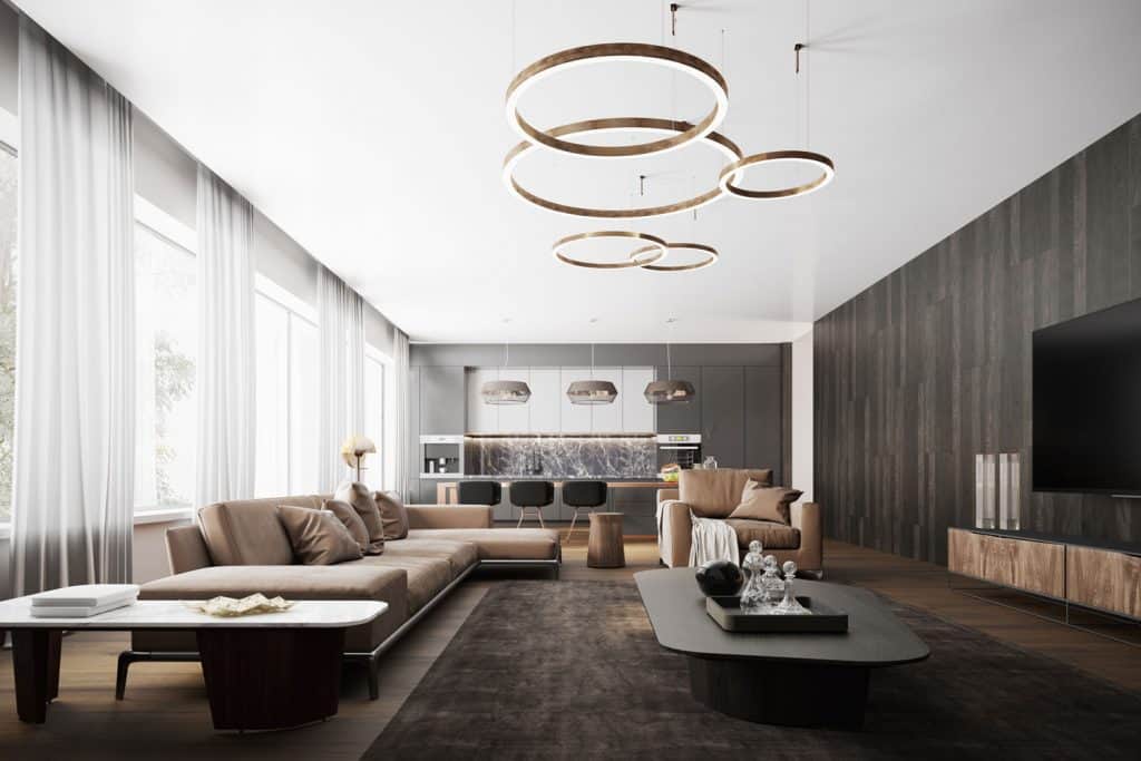 Ultra modern contemporary living room, white ceiling, white floor length curtains, and a long brown sectional sofa