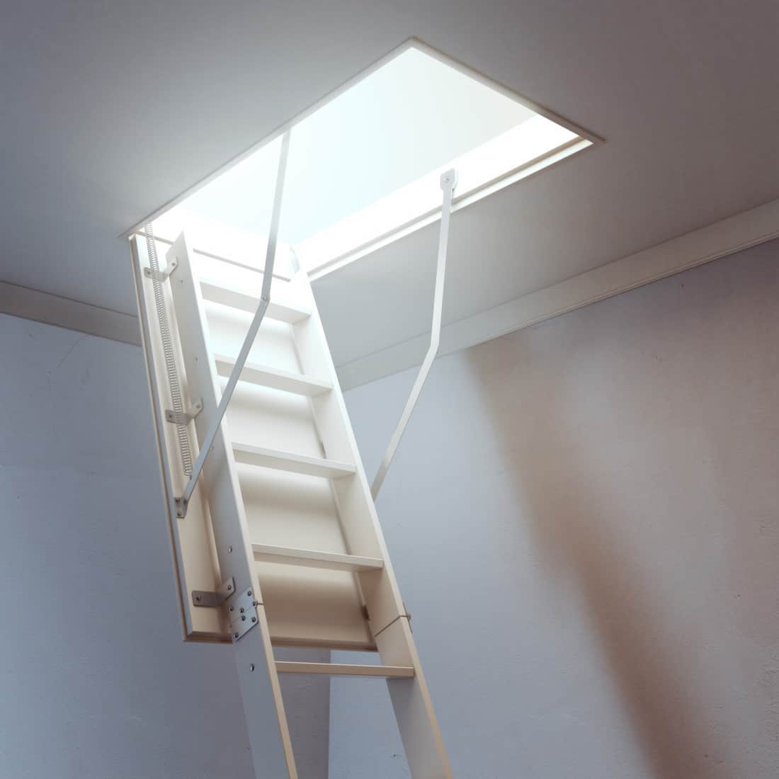 Wooden ladder to the attic
