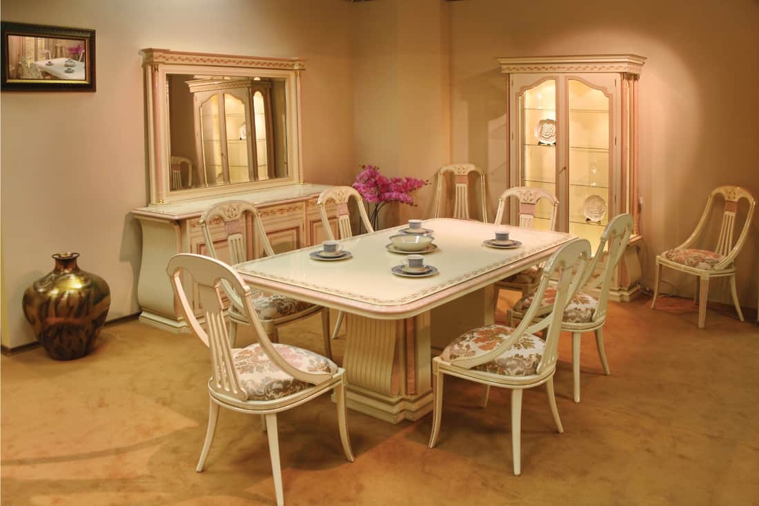 dining room with mirror above a sideboard table. How High Should A Mirror Be Above A Sideboard