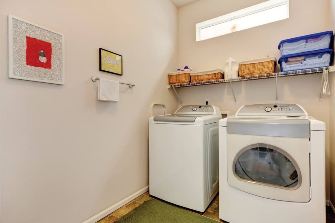 laundry room design with washer, dryer, wall mounted rack. What's The Average Laundry Room Size By Dimensions