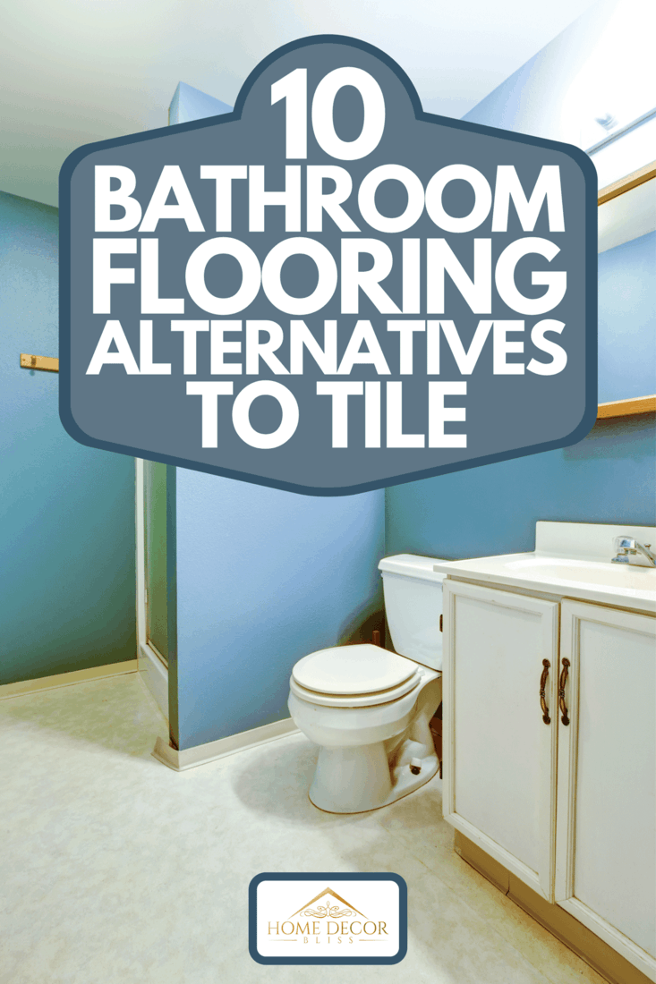 A blue old style bathroom interior with linoleum flooring, white washbasin cabinet with mirror and toilet, 10 Bathroom Flooring Alternatives To Tile