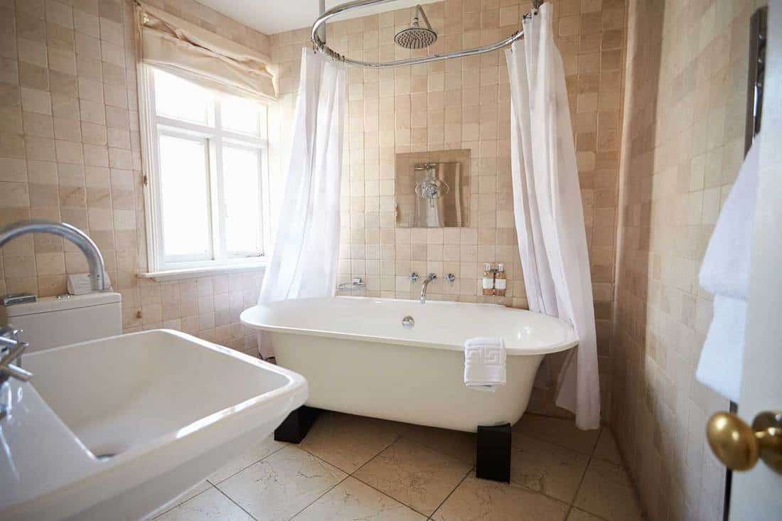 Bathroom with free standing bath and shower