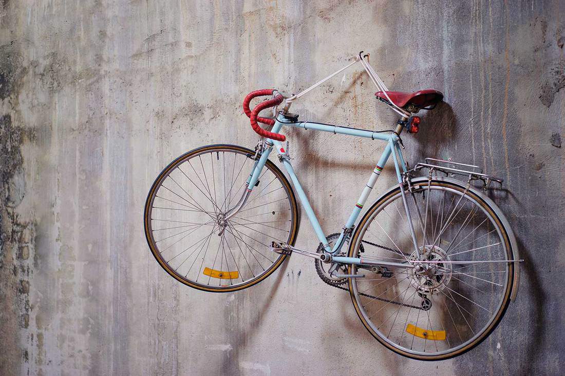 Bicycle hanging on wall