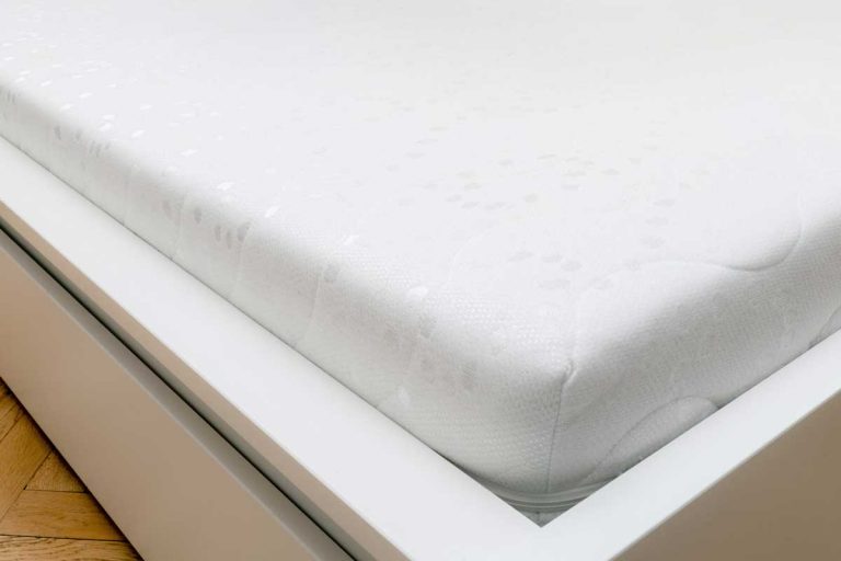 Close up of memory foam mattress on the bed frame at sleeping room, Can You Wash The Cover Of A Memory Foam Mattress?