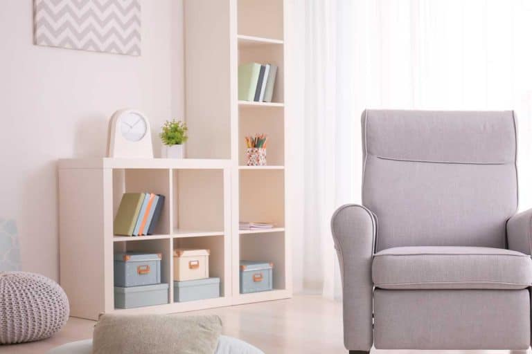 Elegant living room interior with shelving unit and comfortable armchair, Can You Paint The Ikea Kallax? [And How To]