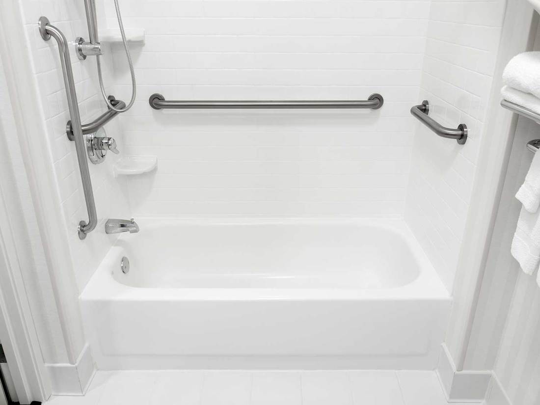 Handicapped disabled access bathroom bathtub with grab bars
