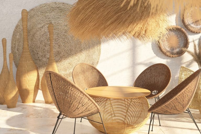 Interior of a modern living room with wicker furniture and rattan and straw décor. Round dining table. Ethnic style, Does Rattan Furniture Attract Bugs?