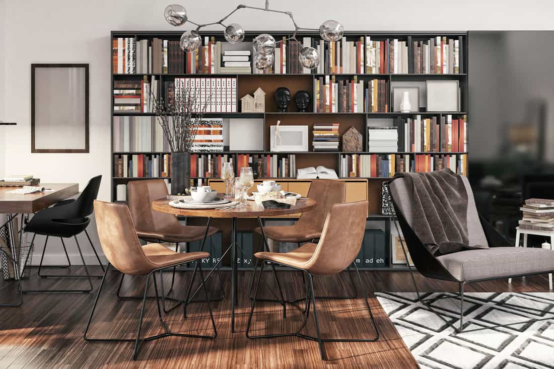 Interior of an ultra modern living room with a huge bookcase on the back and contemporary designed furnitures, Can An Ikea Billy Bookcase Be Wall-Mounted?