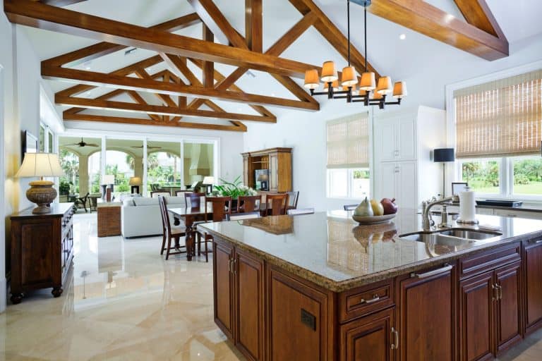 Kitchen with a View and a truss detail exposed, 11 Unique Ceiling Ideas For Living Room You Need To See