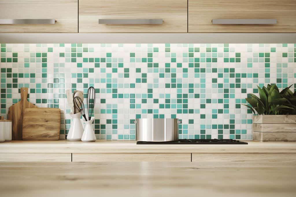 Mint and green tiled kitchen backsplash