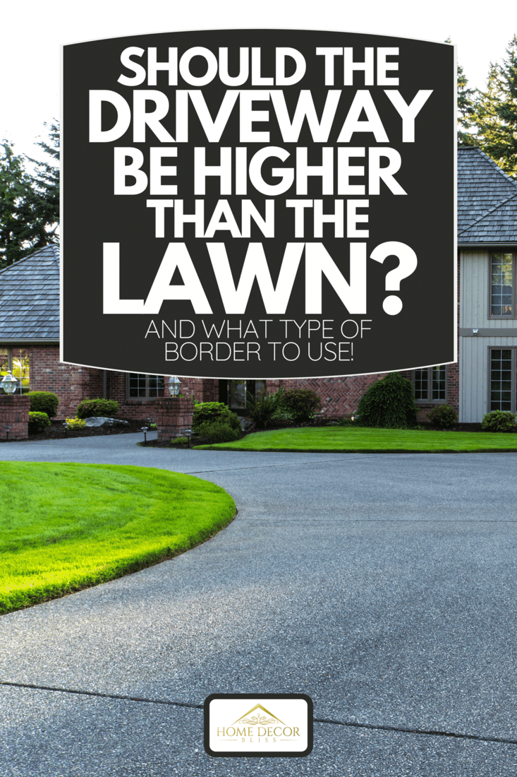 A large concrete driveway to a home, Should The Driveway Be Higher Than The Lawn? [And What Type Of Border To Use!]