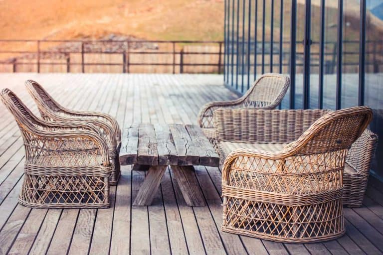 Terrace of a home with rattan furnitures, How To Clean Bamboo And Rattan Furniture [5 Easy Steps!]