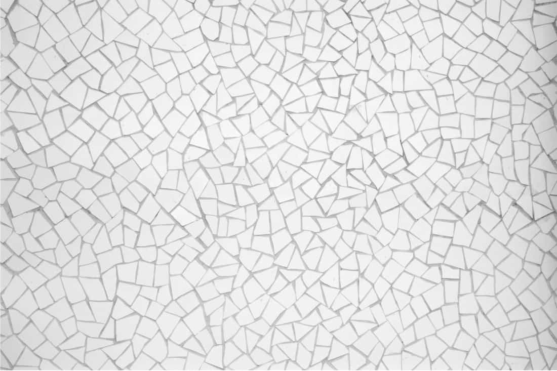 White tiles mosaic background. crushed mosaic tile backsplash