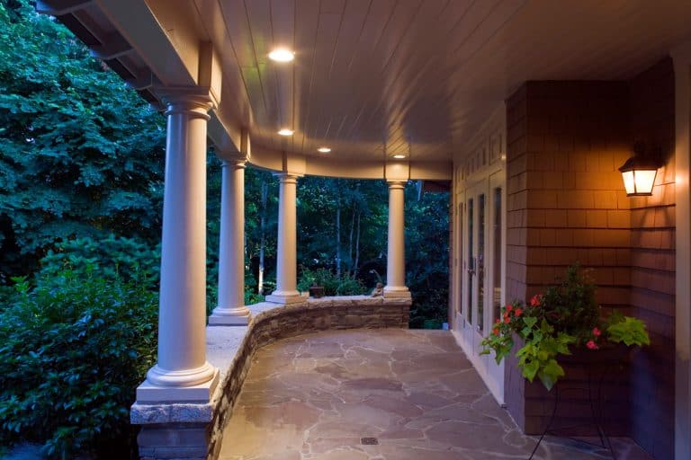 front porch luxury estate home int the woods, 15 Porch Tile Ideas To Revamp The Space