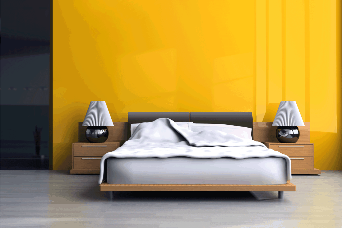 yellow bedroom with low rise bed