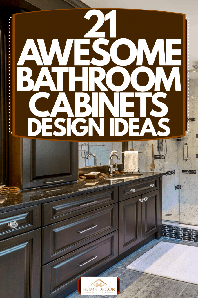 Interior of an ultra modern bathroom with marble tile wall, glass shower area, and dark cabinetry in the vanity, 21 Awesome Bathroom Cabinets Design Ideas
