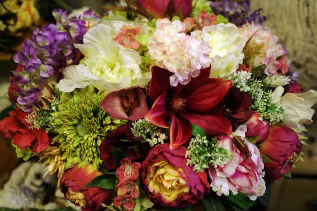 A beautiful array of lilies, roses, and other varieties of flowers