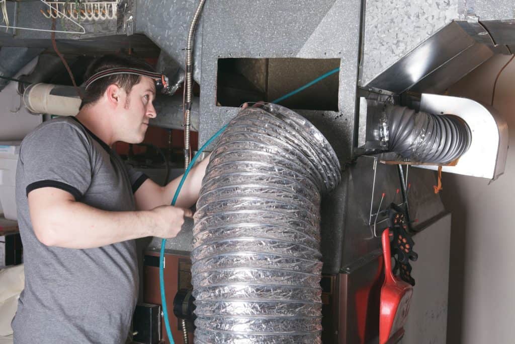 A ducting installer doing his expertise 