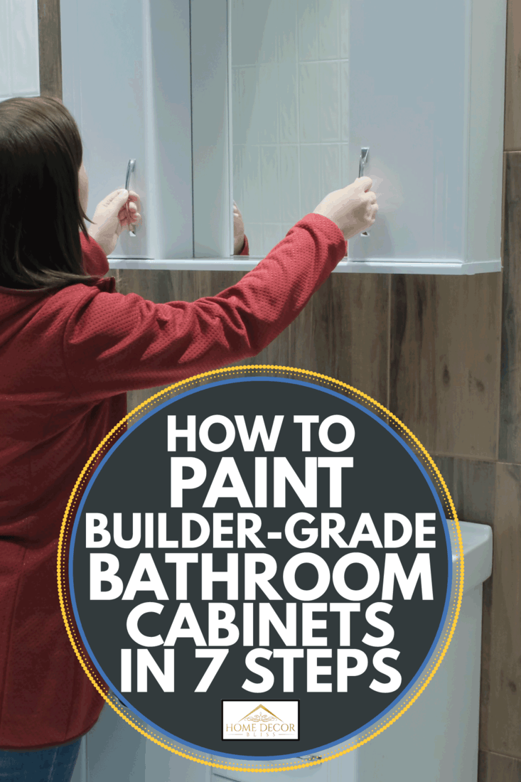Caucasian woman inspecting bathroom cabinet for repainting. How To Paint Builder-Grade Bathroom Cabinets In 7 Steps