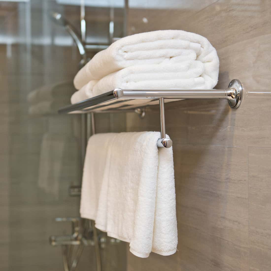 Clean white towel on a hanger prepared to use. 
