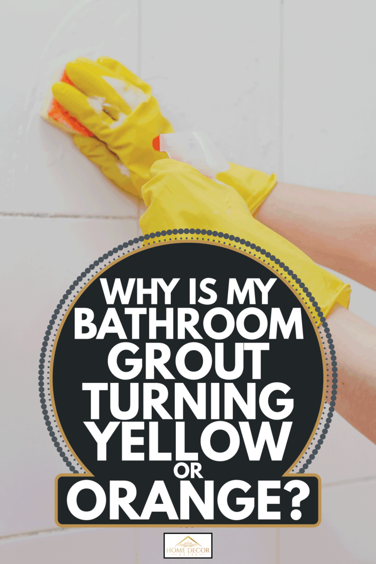 Cleaning bathroom tiles. Women washing bath walls. Housemaid cleaning up tiles of bath. Why Is My Bathroom Grout Turning Yellow Or Orange