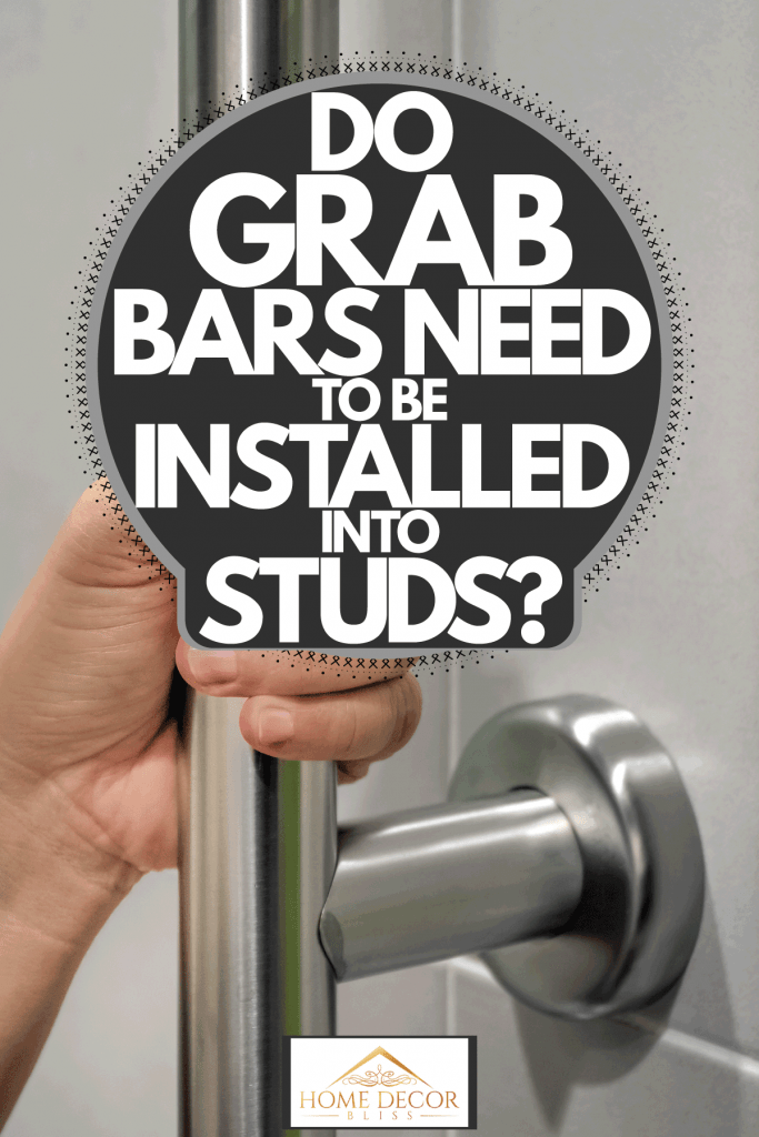 A woman holding a grab bar inside the bathroom, Do Grab Bars Need To Be Installed Into Studs?