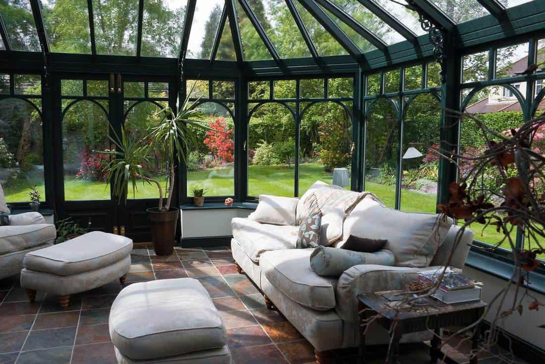 English conservatory sunroom with modern furniture