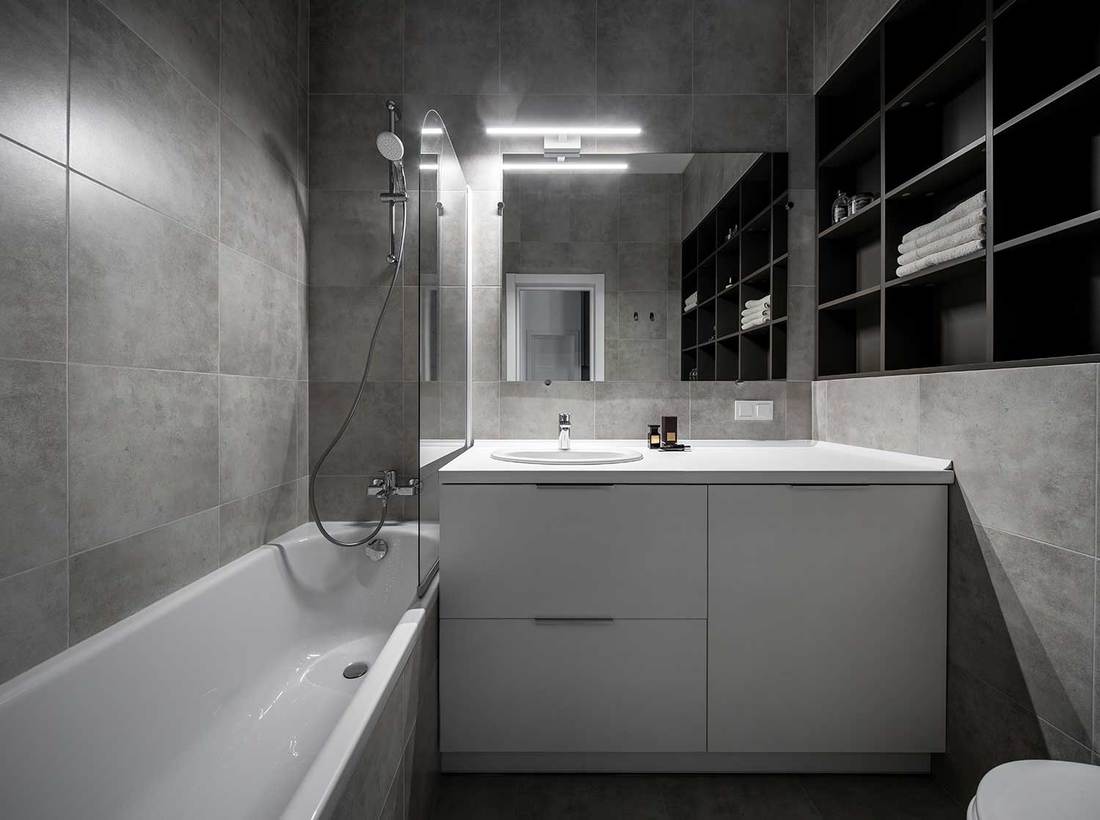 Great bathroom in modern style with gray tiled walls