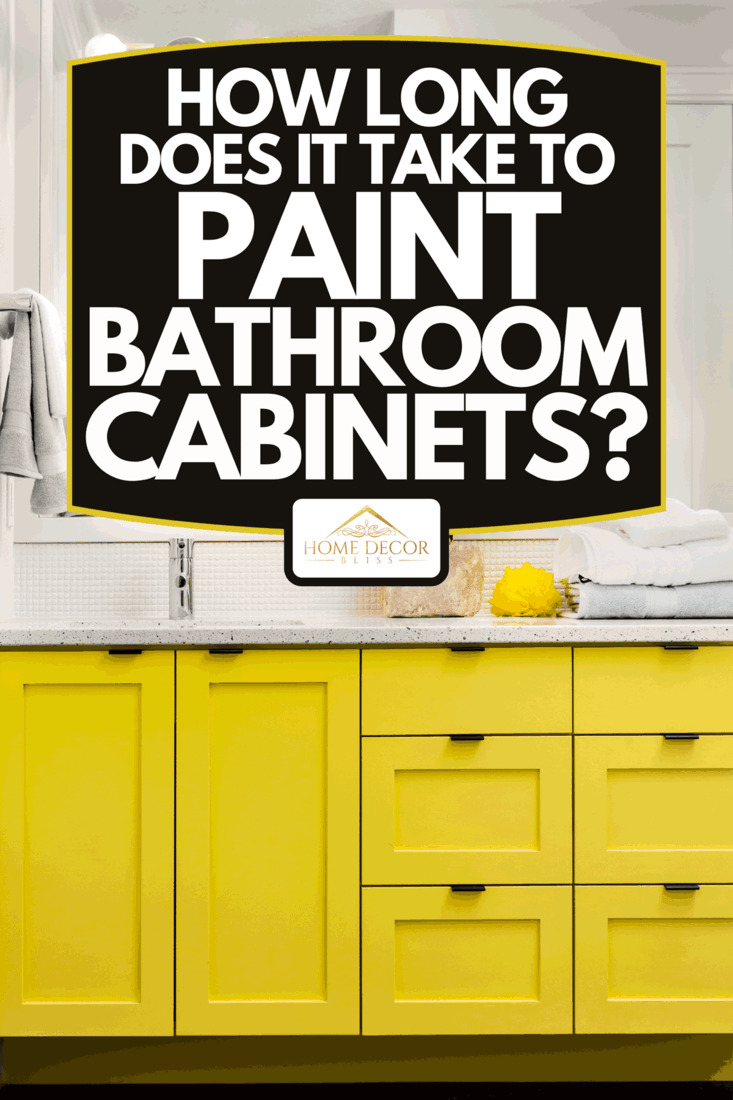 A close up of sink, faucet, countertop, yellow cabinets and mirror, How Long Does It Take To Paint Bathroom Cabinets?