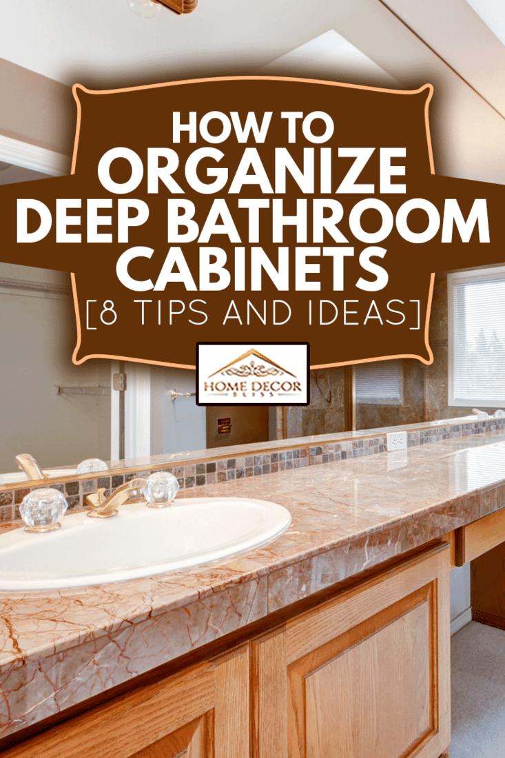 Large luxury bathroom with red granite countertops and tub, How To Organize Deep Bathroom Cabinets [8 Tips And Ideas]