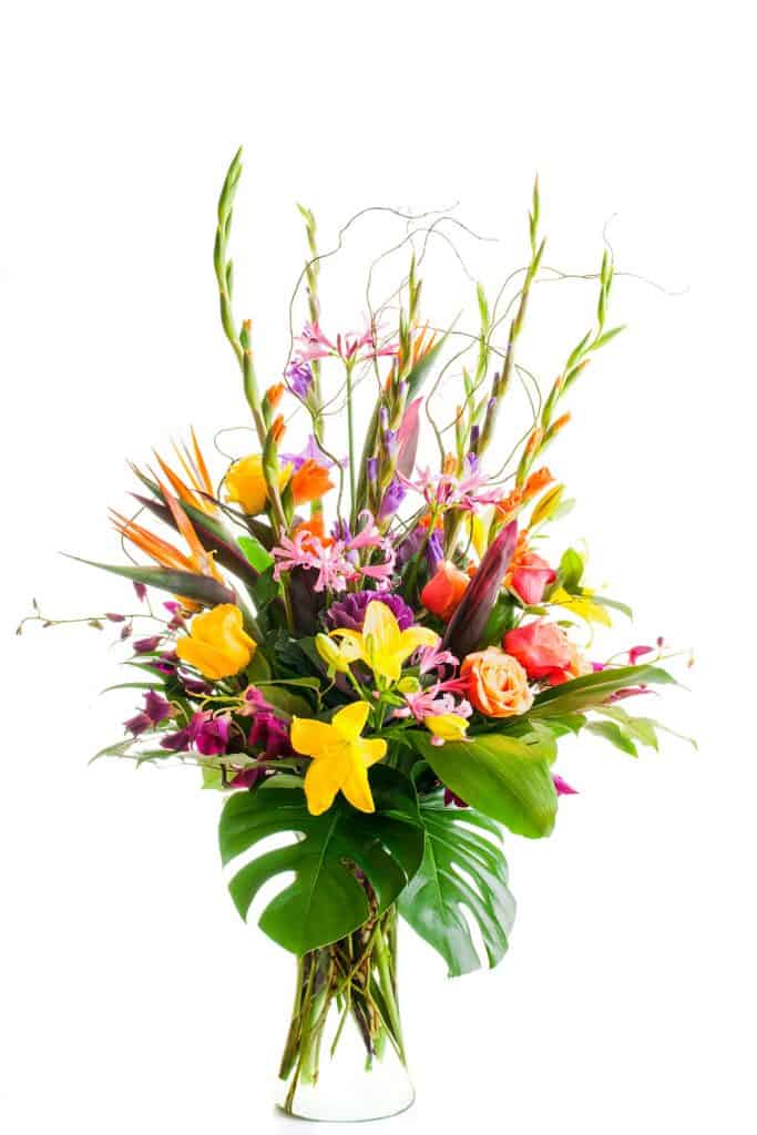 Mixed flower arrangement using different kinds of flowers on a white background