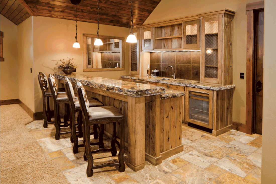 Rustic Wet Bar with bright colored wood and stone countertop