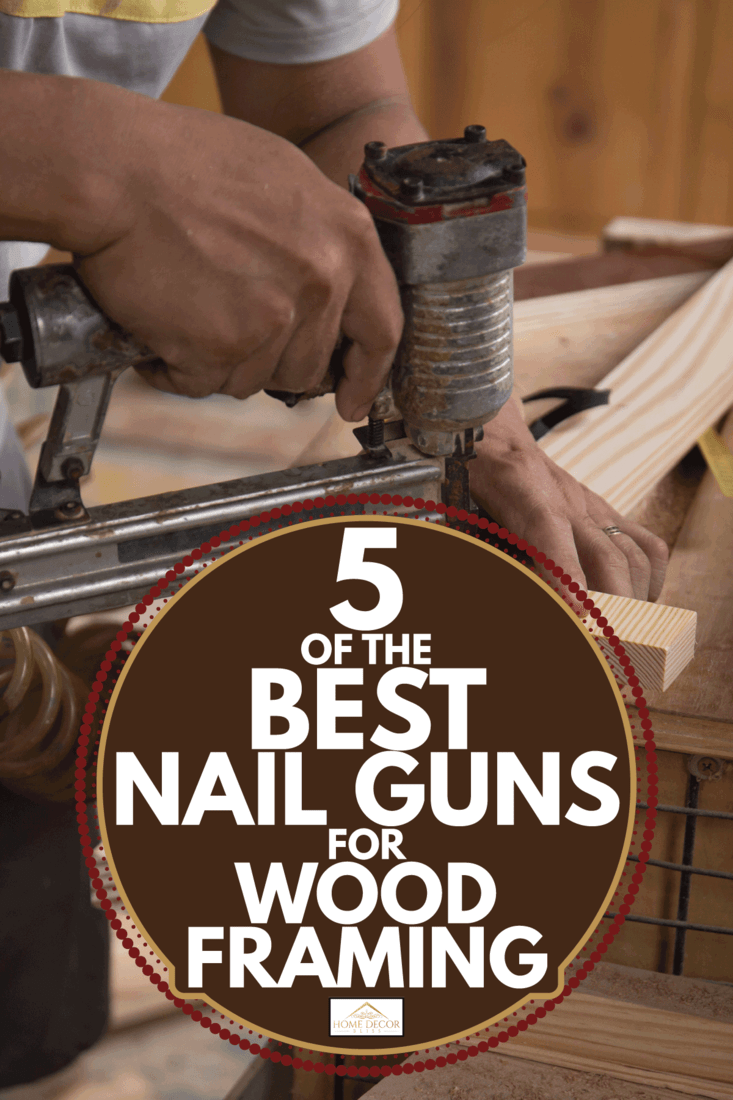 carpenter working in the workshop and using a nail gun. 5 Of The Best Nail Guns For Wood Framing