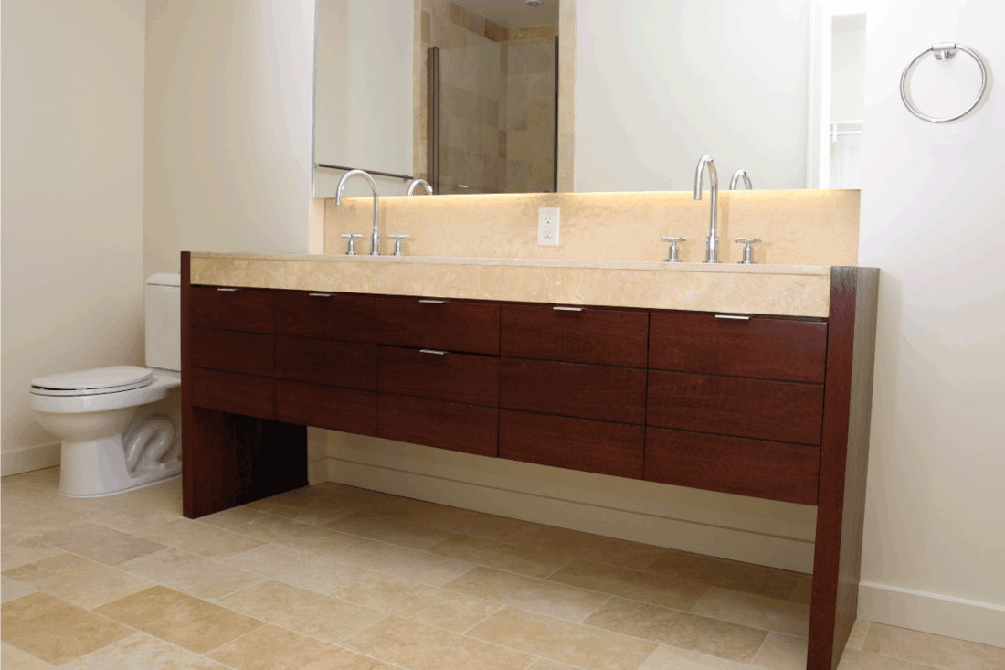 modern bathroom with two sinks and large vanity mirror. What Size Vanity Do You Need For 2 Sinks