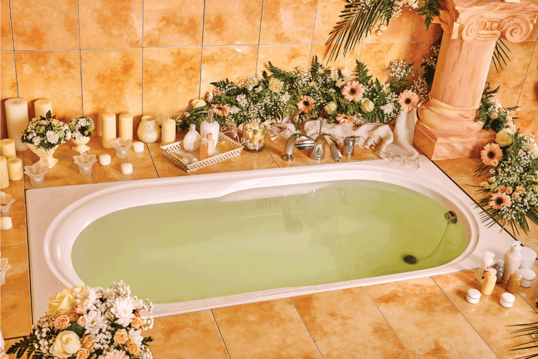 Bathroom interior with bubble bath. Drop-in tub under-mount