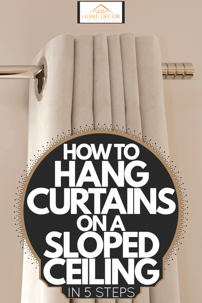 A beige colored curtain hanged on the stainless steel rod, How To Hang Curtains On A Sloped Ceiling In 5 Steps