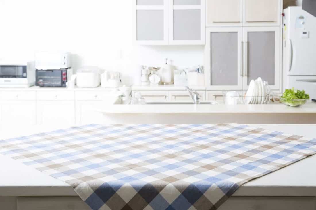 Kitchen background with table cloth.