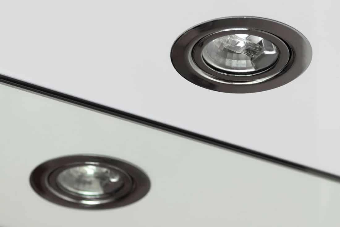 Recessed halogen lamp and reflection in the washbasin mirror, Can You Install Recessed Lighting Without Housing?