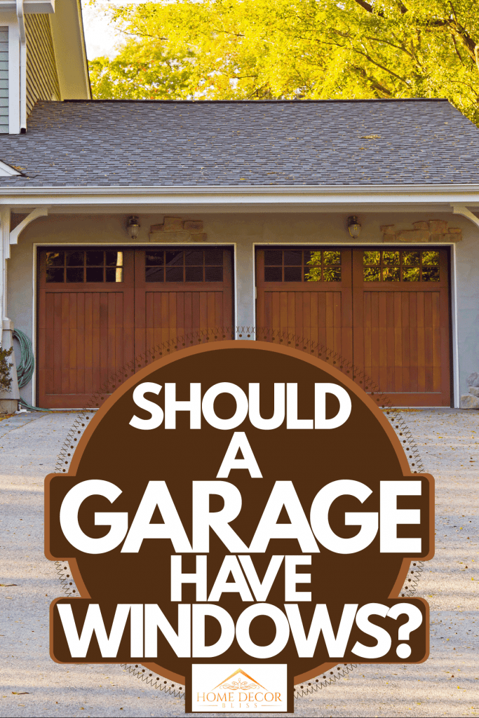 A two wooden garage door with small window and a two storey house, Should A Garage Have Windows?