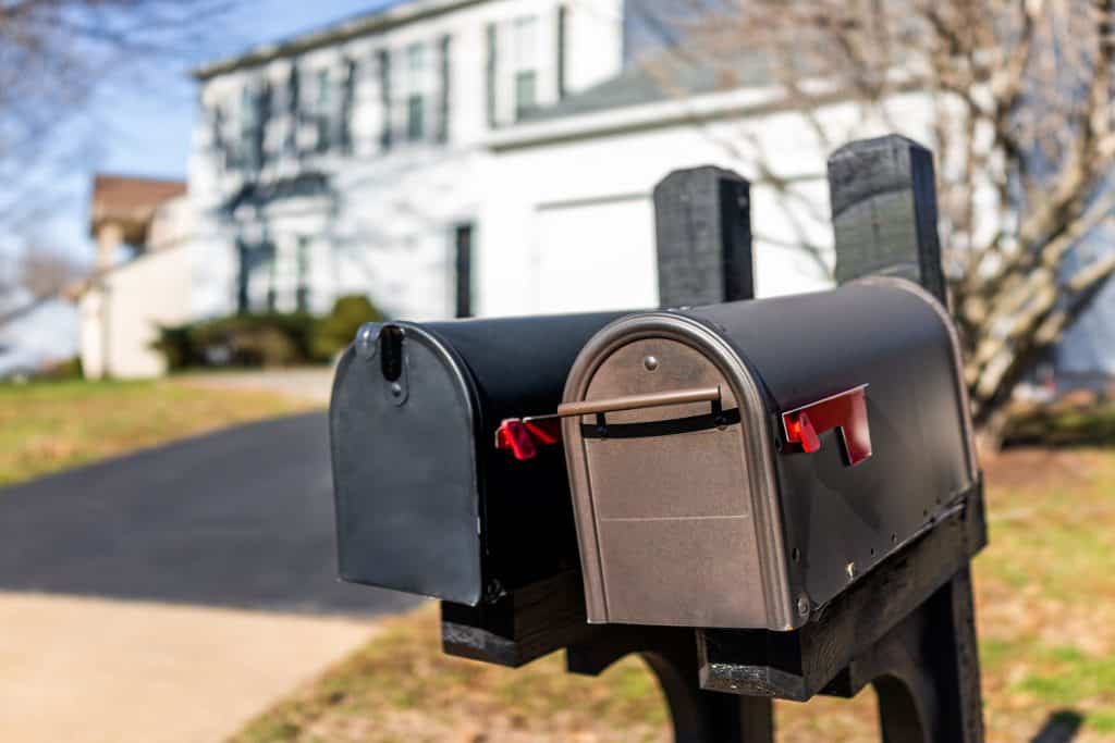 Two black colored mailboxes