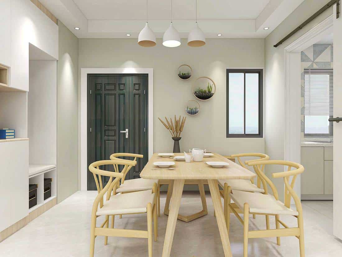 Warm dining room area design, wooden table and chair