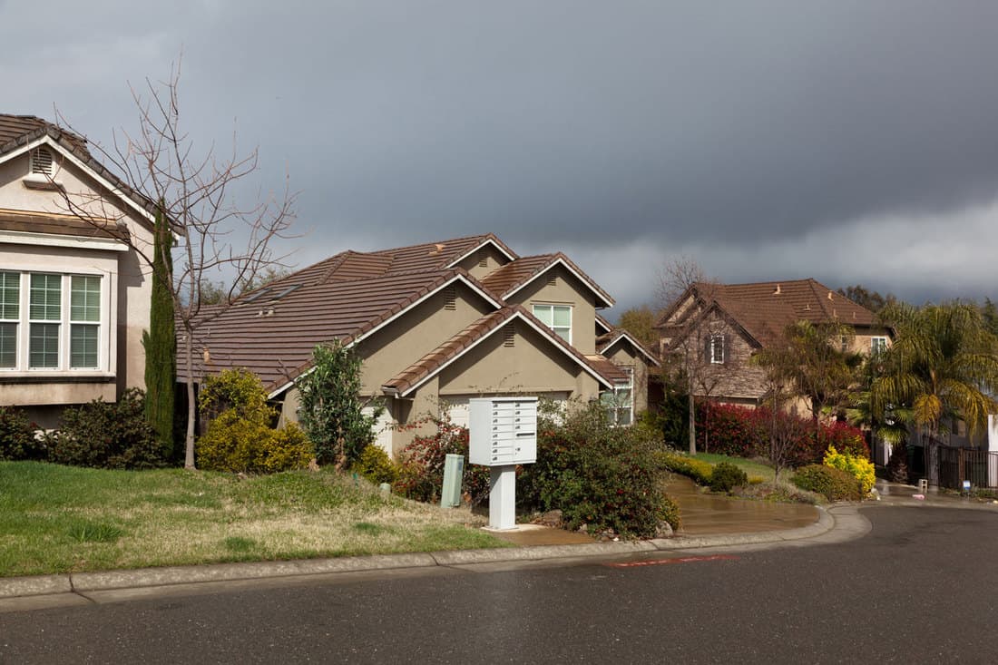 torm passing over upscale neighborhood in California with cluster mailbox