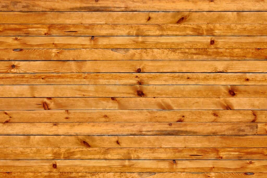 An up close and detailed photo of Knotty pine wall