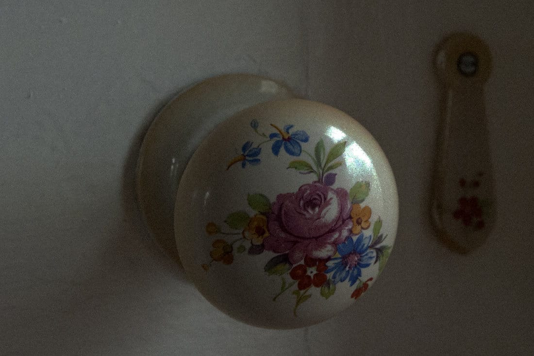 Ceramic door knob with flower design